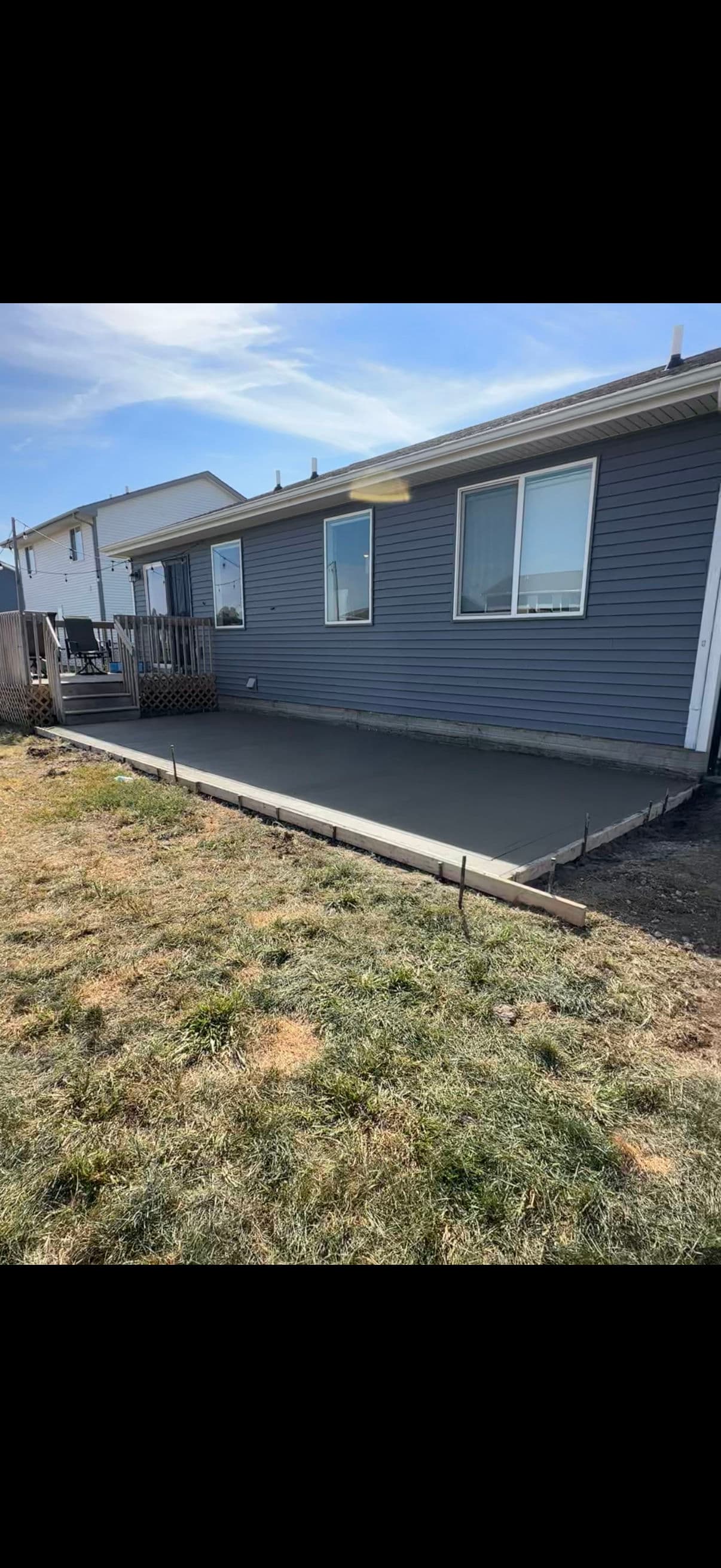 Project Beautiful Backyard Concrete Patio Installation image